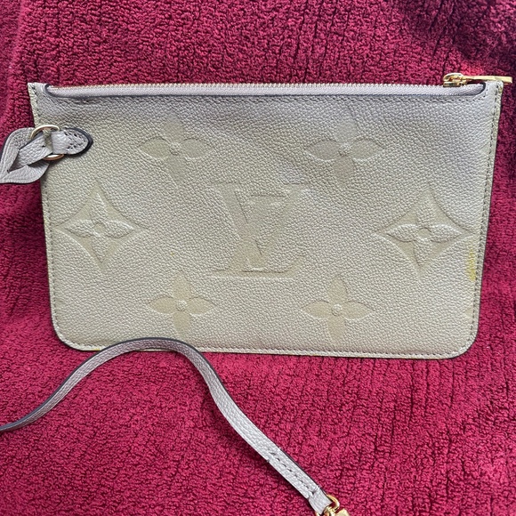 Louis Vuitton Handbags - Louis Vuitton Carryall Empreinte Pouch in Turtledove Louis Vuitton